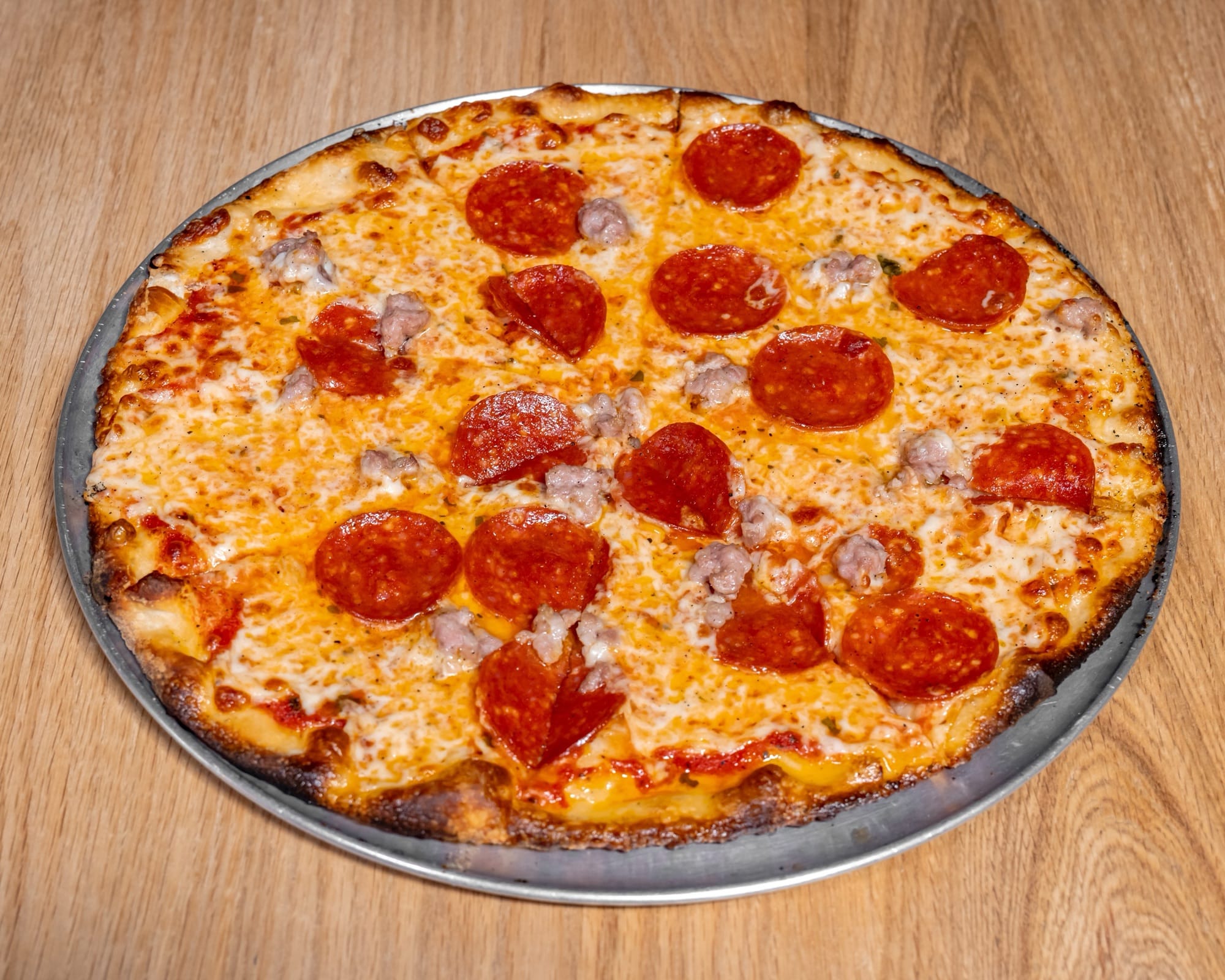 The Capone pizza — Pepperoni, Jimmy's Italian sausage.
