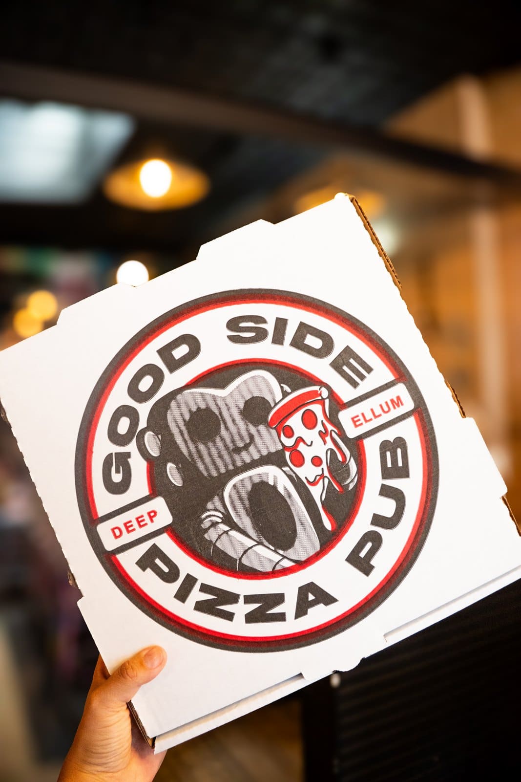 A Good Side Pizza Pub box held up