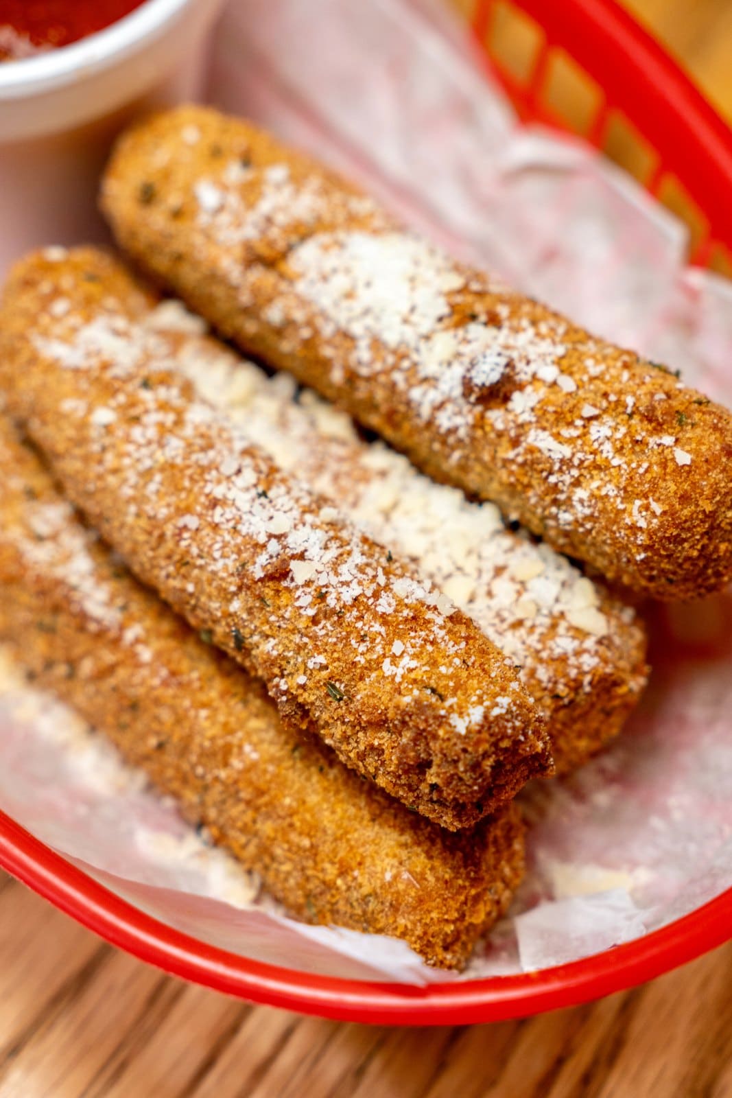 Fried cheese sticks in a basket