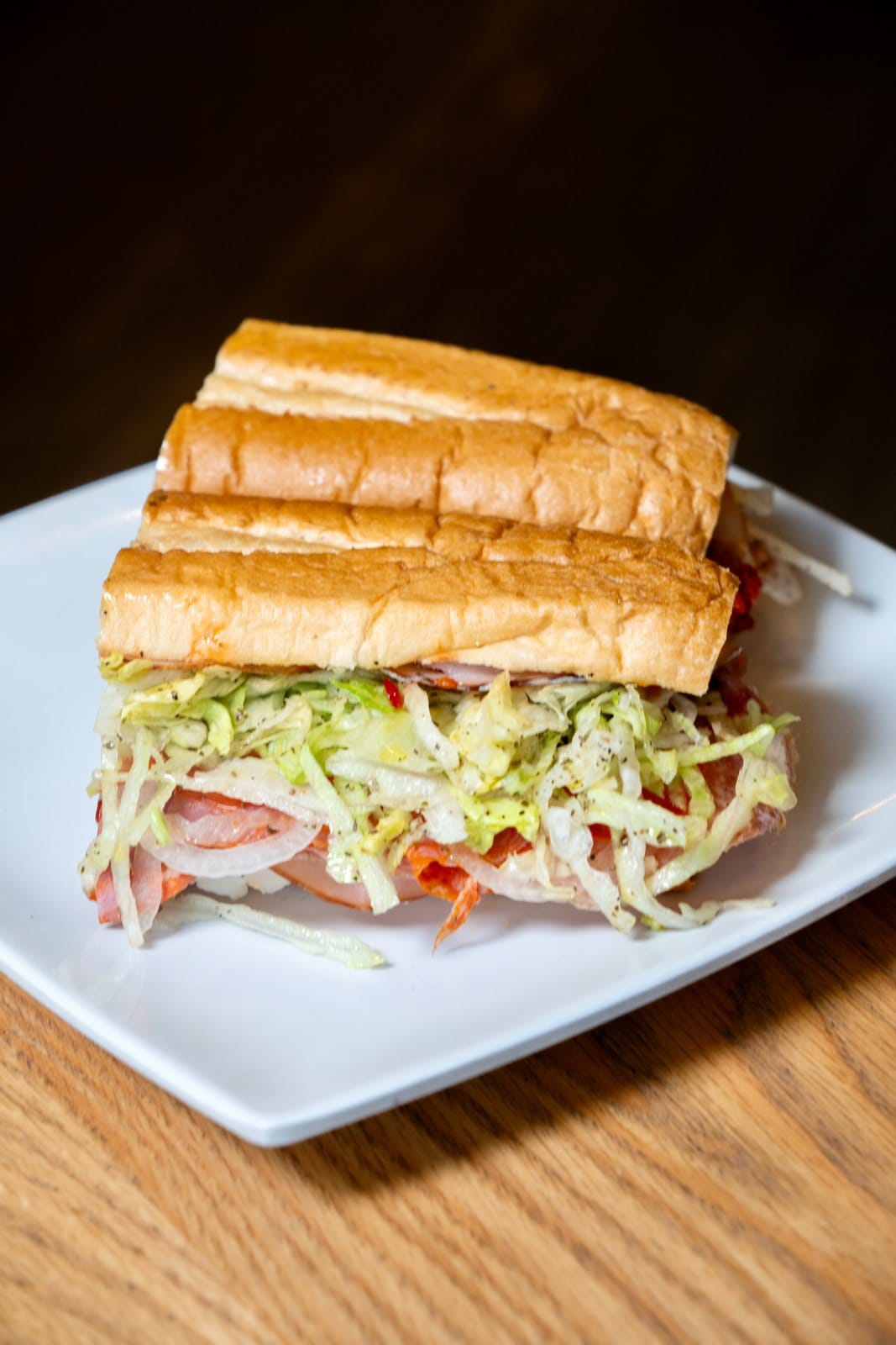 A sub sandwich on a plate.